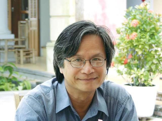 Portrait of architect Bùi Kiến Quốc, founder of Triêm Tây Village
